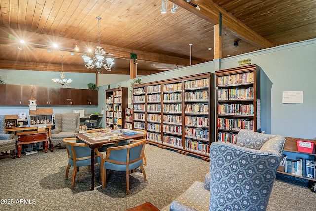 office with lofted ceiling with beams, carpet, wooden ceiling, a chandelier, and wall of books