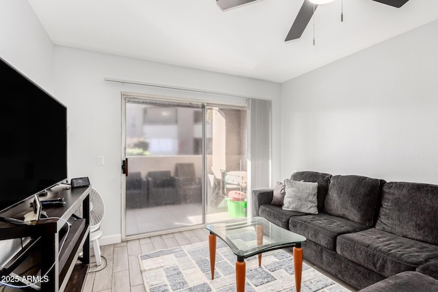 living room featuring ceiling fan