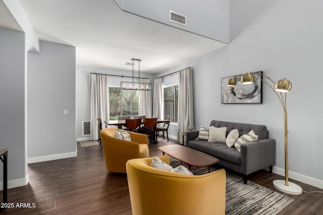 25210 N 40th Ave, Phoenix, AZ 85083 - living area with dark wood-type flooring and a chandelier