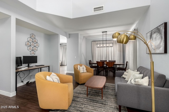25210 N 40th Ave, Phoenix, AZ 85083 - living area featuring wood finished floors and a chandelier
