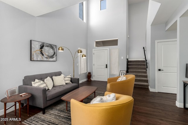 25210 N 40th Ave, Phoenix, AZ 85083 - living room featuring wood finished floors, stairway, and a towering ceiling