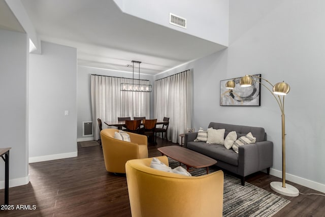 25210 N 40th Ave, Phoenix, AZ 85083 - living area with dark wood-type flooring and a chandelier