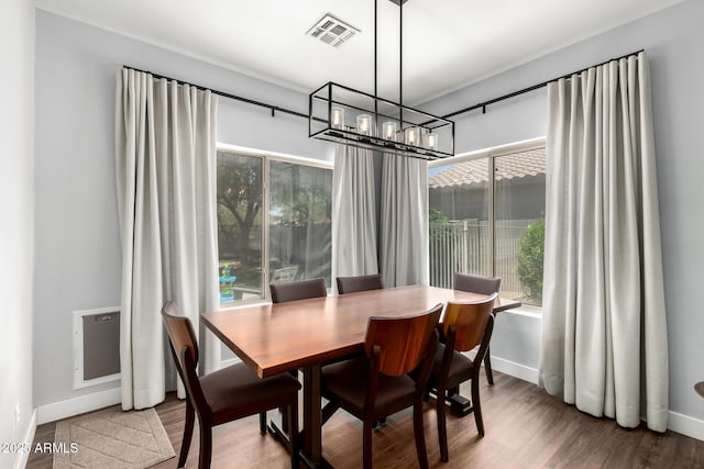 25210 N 40th Ave, Phoenix, AZ 85083 - dining room featuring a chandelier and wood finished floors