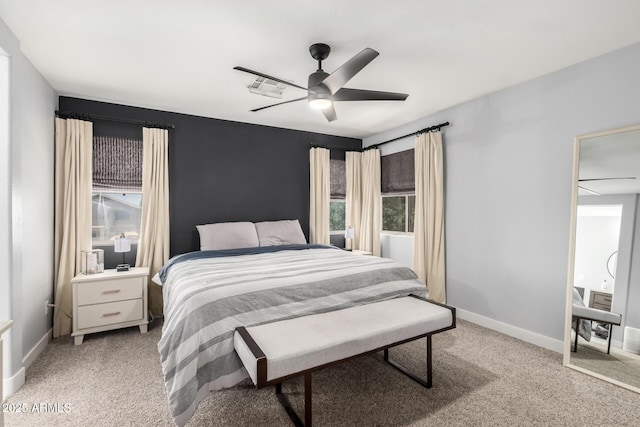 25210 N 40th Ave, Phoenix, AZ 85083 - bedroom with multiple windows, light carpet, and a ceiling fan
