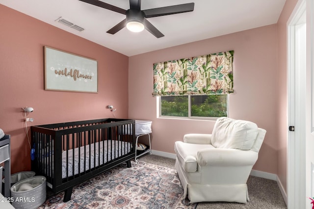 25210 N 40th Ave, Phoenix, AZ 85083 - carpeted bedroom with a nursery area and a ceiling fan