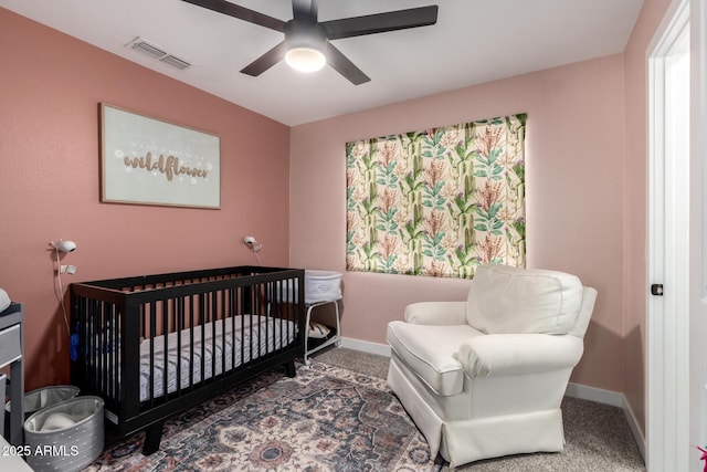 25210 N 40th Ave, Phoenix, AZ 85083 - carpeted bedroom featuring a nursery area and ceiling fan