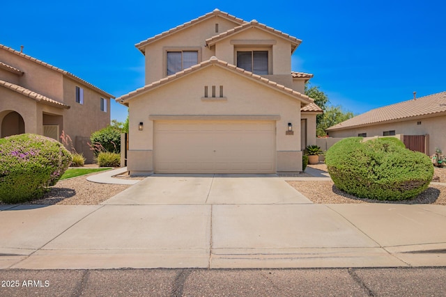 25210 N 40th Ave, Phoenix, AZ 85083 - mediterranean / spanish-style home with stucco siding, driveway, a tile roof, and an attached garage