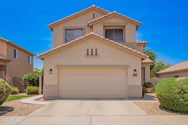 25210 N 40th Ave, Phoenix, AZ 85083 - mediterranean / spanish home with an attached garage, a tiled roof, stucco siding, and concrete driveway