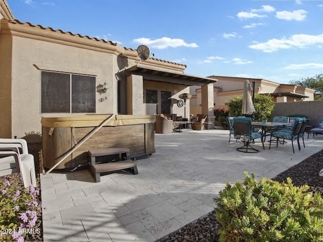 view of patio featuring a hot tub
