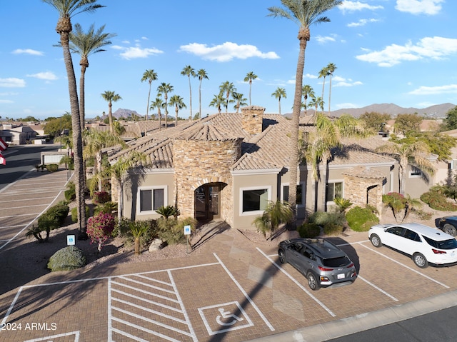 view of front of home featuring a mountain view