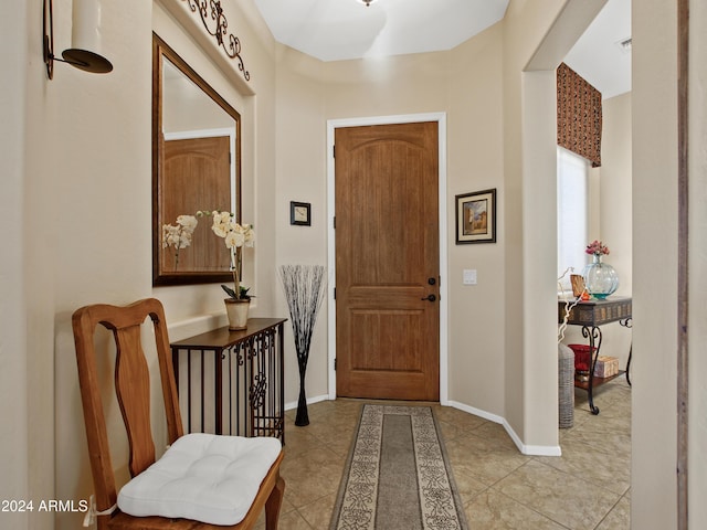 view of tiled foyer entrance
