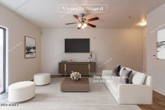 living room with ceiling fan