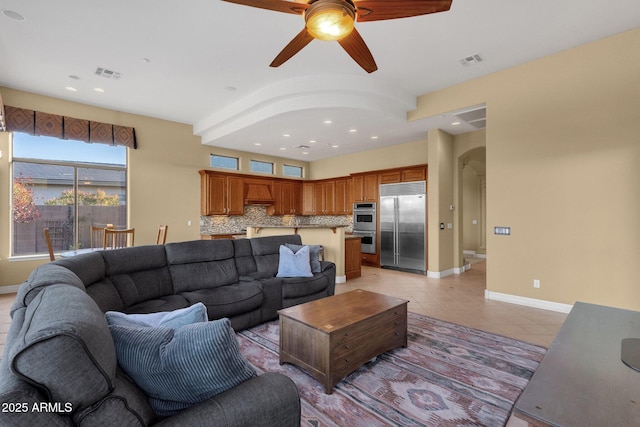 living room with light tile patterned floors