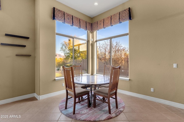 view of tiled dining space