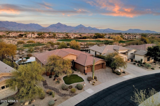 aerial view at dusk with a mountain view