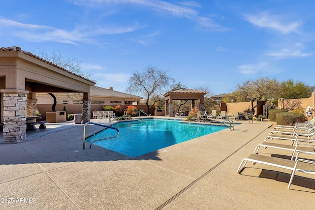 view of pool with a gazebo and a patio