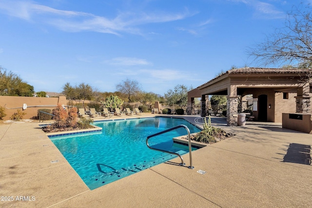 view of pool with a patio area