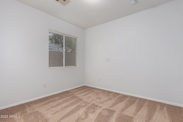 unfurnished room featuring carpet flooring