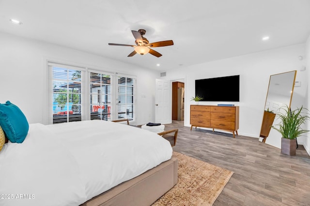 4020 N 34th St, Phoenix, AZ 85018 - bedroom with recessed lighting, a ceiling fan, baseboards, and wood finished floors