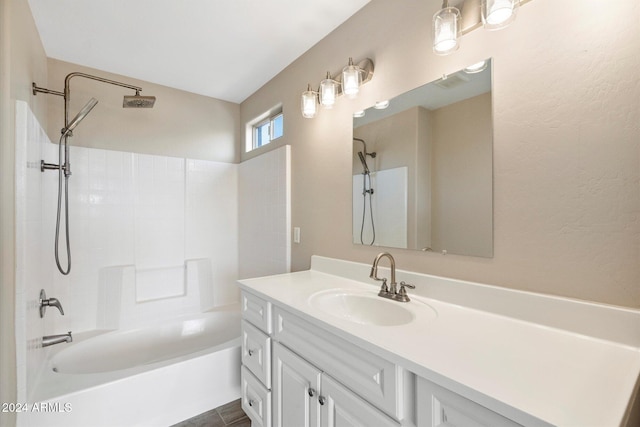 bathroom with shower / tub combination and vanity