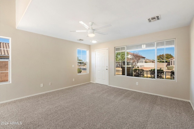 carpeted empty room with ceiling fan