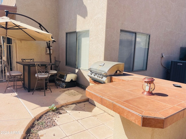 view of patio featuring area for grilling