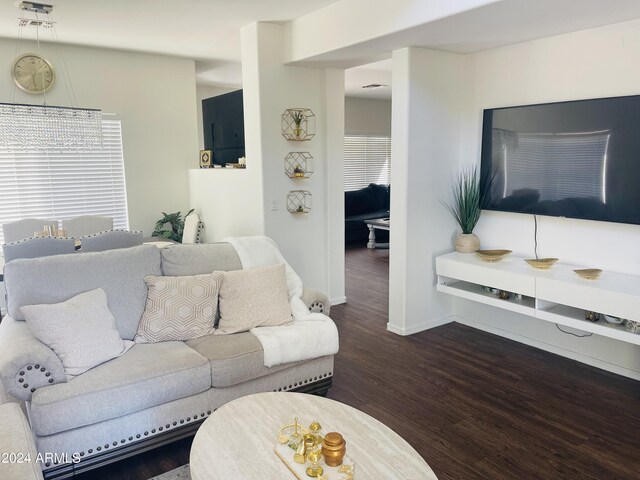 living room with dark wood-type flooring