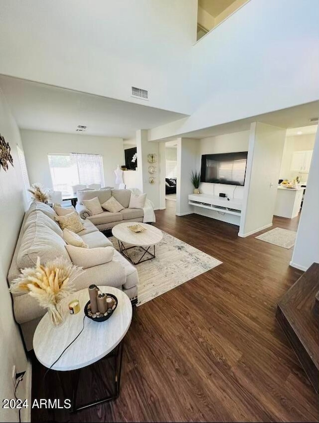 living room with dark wood-type flooring