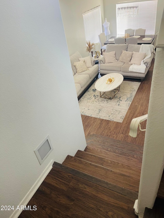 living room with dark hardwood / wood-style floors