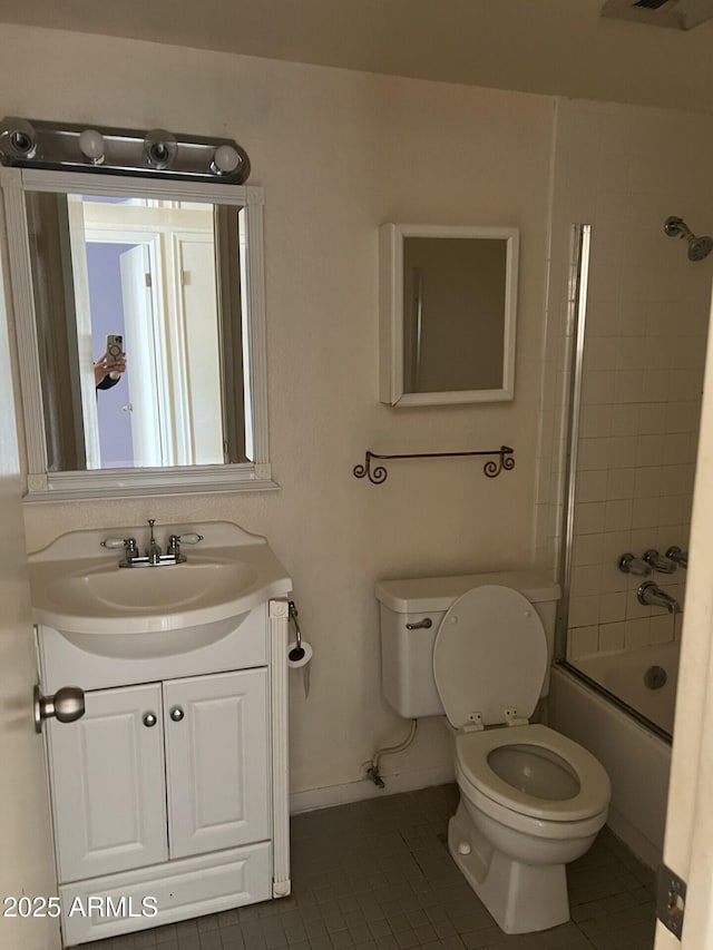 full bathroom with vanity, tile patterned floors, toilet, and combined bath / shower with glass door