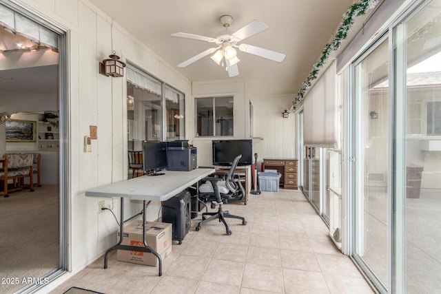 office with light tile patterned floors and a ceiling fan