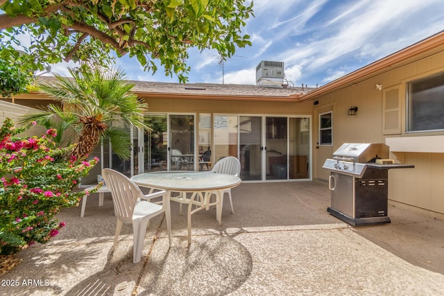 view of patio / terrace with a grill and central AC