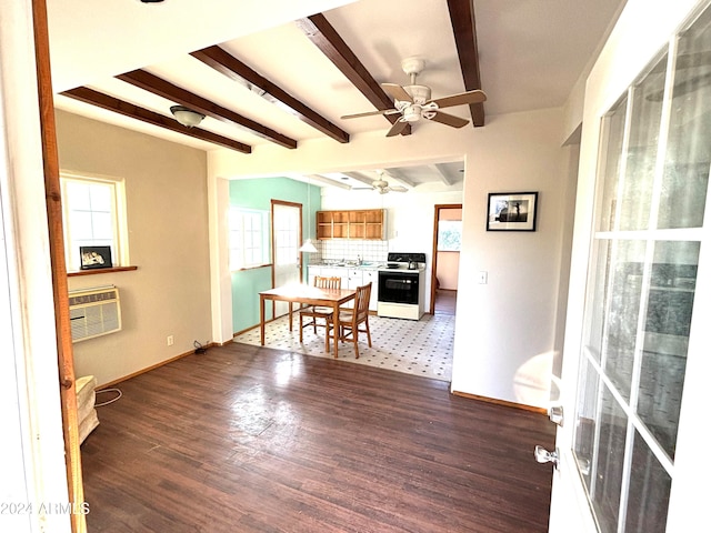 dining space featuring beamed ceiling, wood-type flooring, ceiling fan, and an AC wall unit