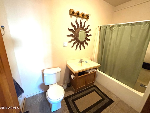 full bathroom featuring tile floors, shower / bath combo, toilet, and vanity