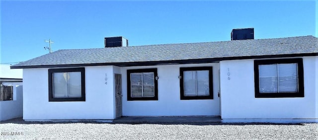 104 N Casa Grande Ave, Casa Grande, AZ 85122 - back of house featuring roof with shingles