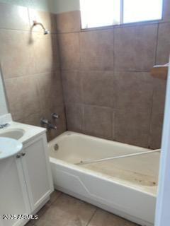 104 N Casa Grande Ave, Casa Grande, AZ 85122 - full bath featuring tile patterned floors, vanity, and shower / washtub combination