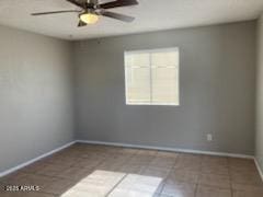 104 N Casa Grande Ave, Casa Grande, AZ 85122 - unfurnished room with baseboards, a ceiling fan, and tile patterned flooring