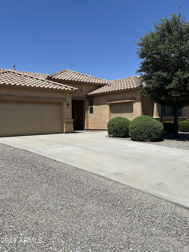 view of front of home featuring a garage