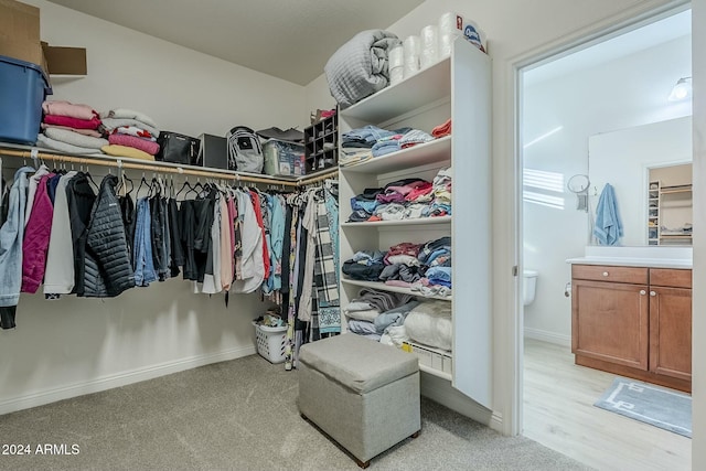 walk in closet featuring light wood-type flooring