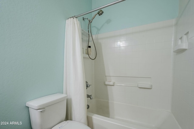 bathroom featuring toilet and shower / bathtub combination with curtain