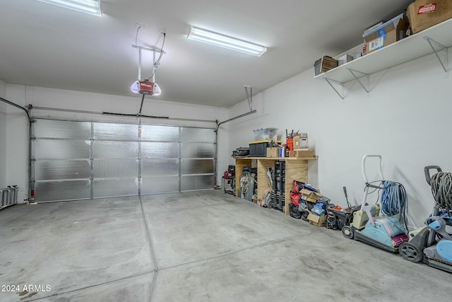 garage featuring a garage door opener