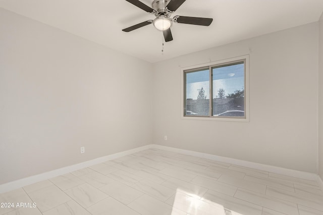 spare room featuring ceiling fan