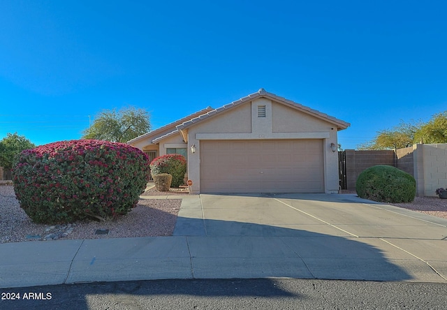 view of front of home with a garage