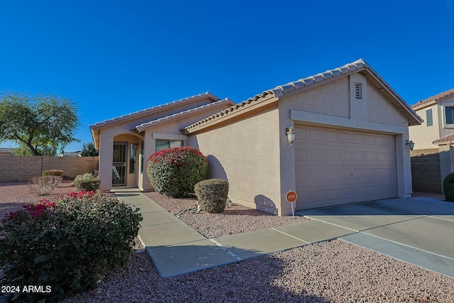 view of front of house with a garage