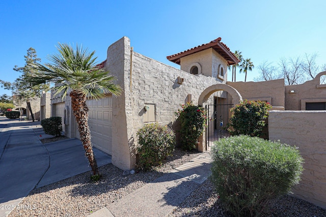 view of front of property with a garage