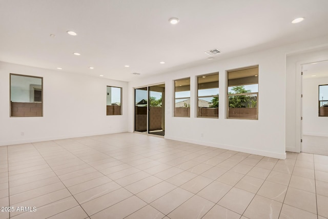 19354 S 212th Pl, Queen Creek, AZ 85142 - empty room featuring plenty of natural light, recessed lighting, and light tile patterned floors