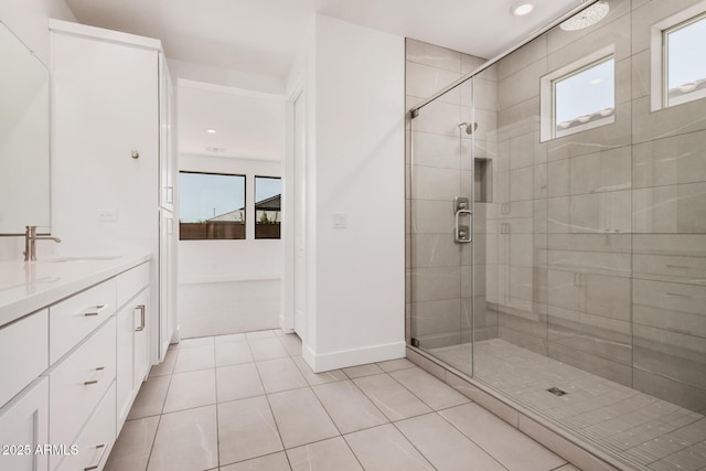19354 S 212th Pl, Queen Creek, AZ 85142 - full bath featuring healthy amount of natural light, a shower stall, vanity, tile patterned flooring, and recessed lighting