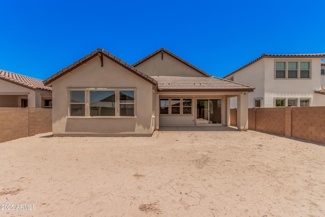 19354 S 212th Pl, Queen Creek, AZ 85142 - back of house featuring a fenced backyard, stucco siding, a patio, and a tile roof