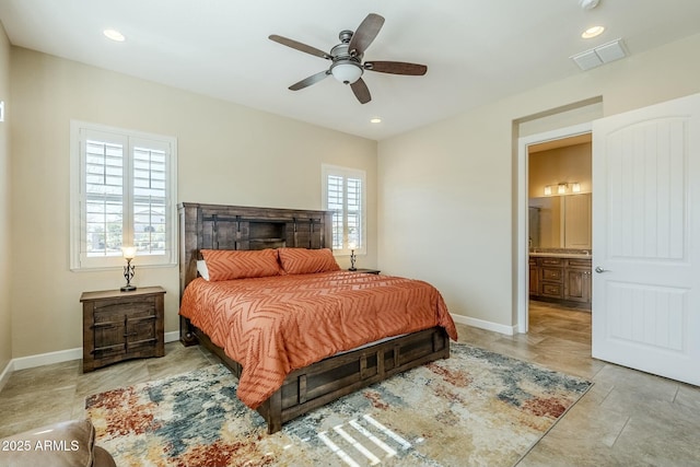 bedroom with connected bathroom and ceiling fan