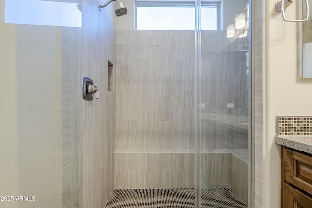 bathroom with vanity and an enclosed shower